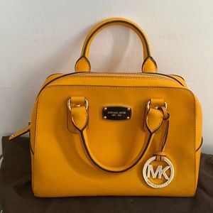 Michael Kors yellow purse.